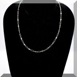 J022. 18K white gold necklace with bezel set diamonds on 16” link chain - $395
